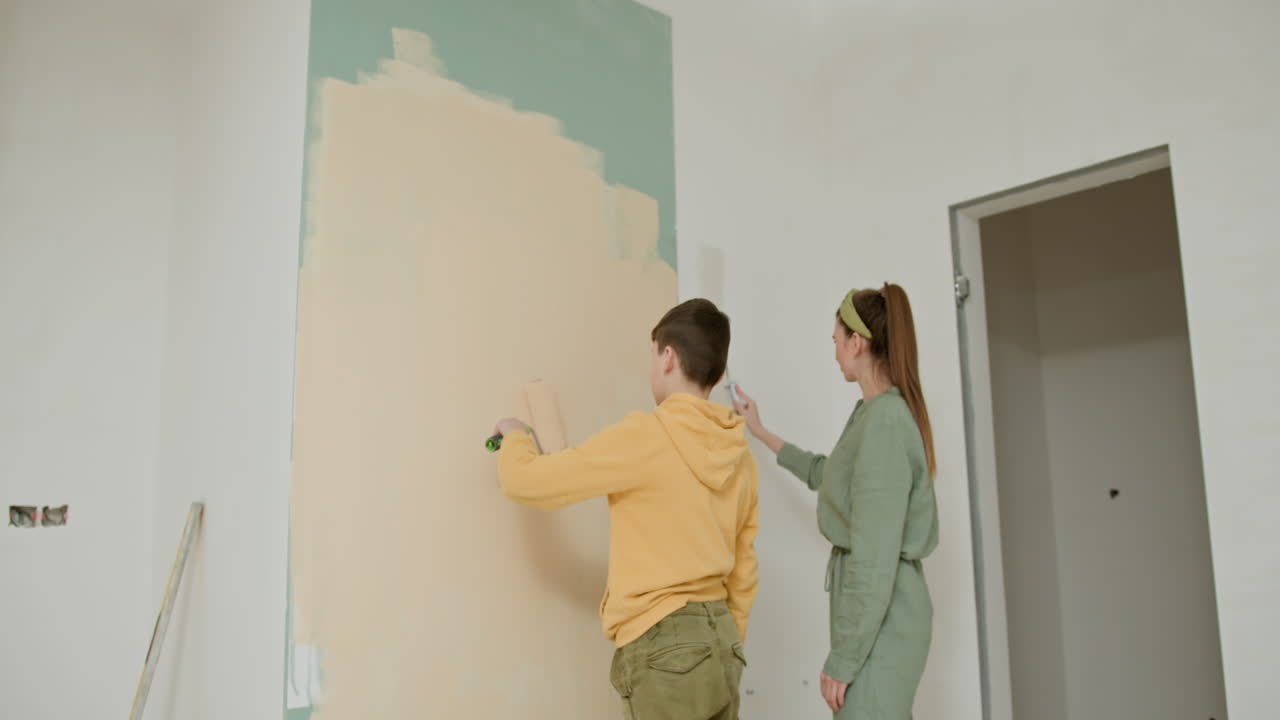 Family Painting a Wall