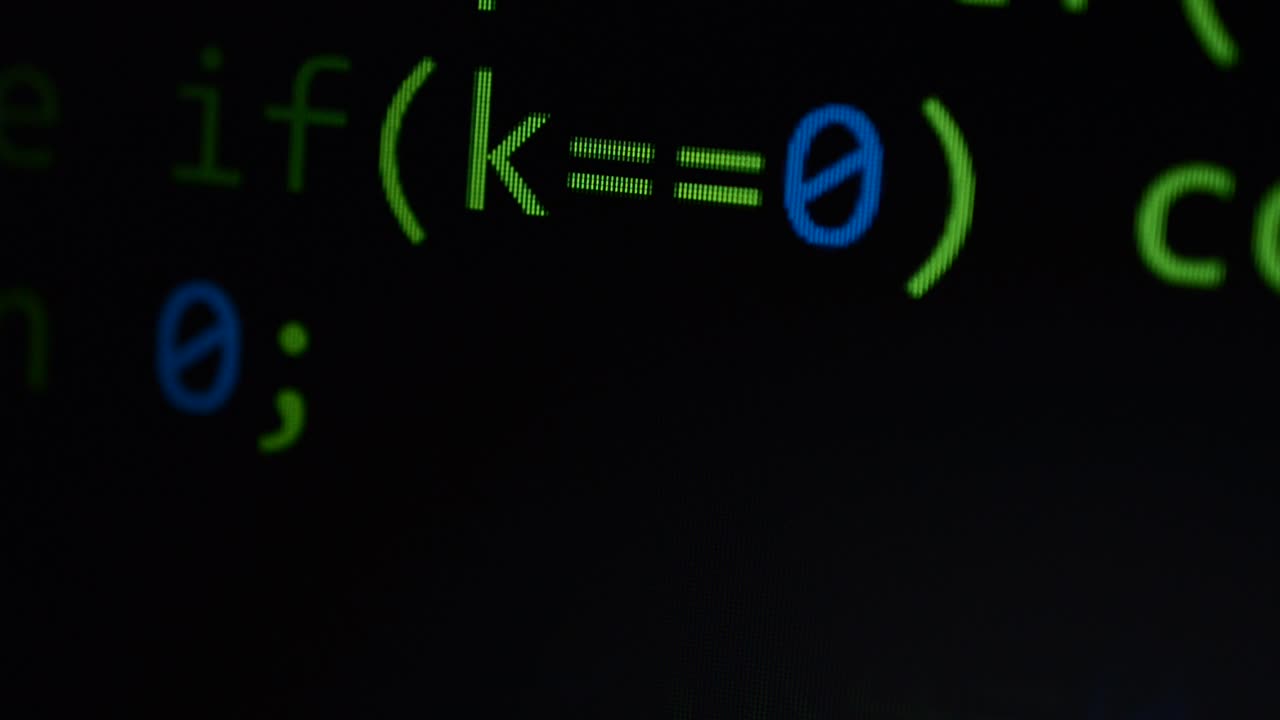 Source code on the monitor screen. Source code