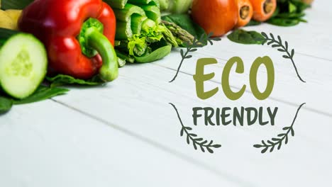 Animation-of-eco-friendly-text-in-green-over-fresh-organic-vegetables-on-wooden-boards