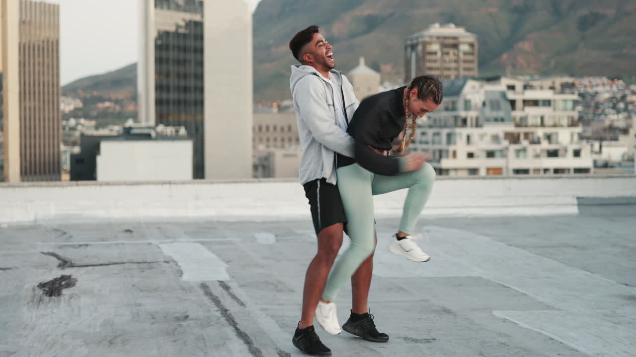 Hug, fitness and couple training on a rooftop