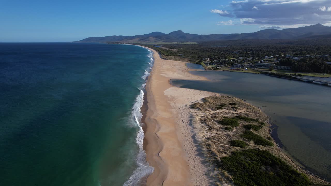 Steels Beach And Scamander River In Tasmania, Australia - Aerial Drone Shot