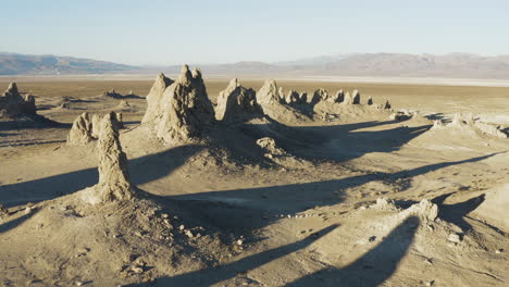 Drone-closing-in-on-the-trona-pinnacles-in-the-california-desert-at-sunrise