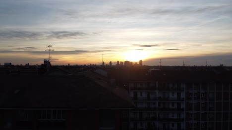 revealing milano city skyline during golden sunset, ascend above buildings