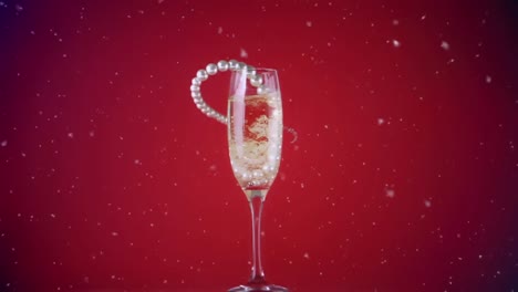 Animation-of-confetti-falling-and-pearl-necklace-in-champagne-glass