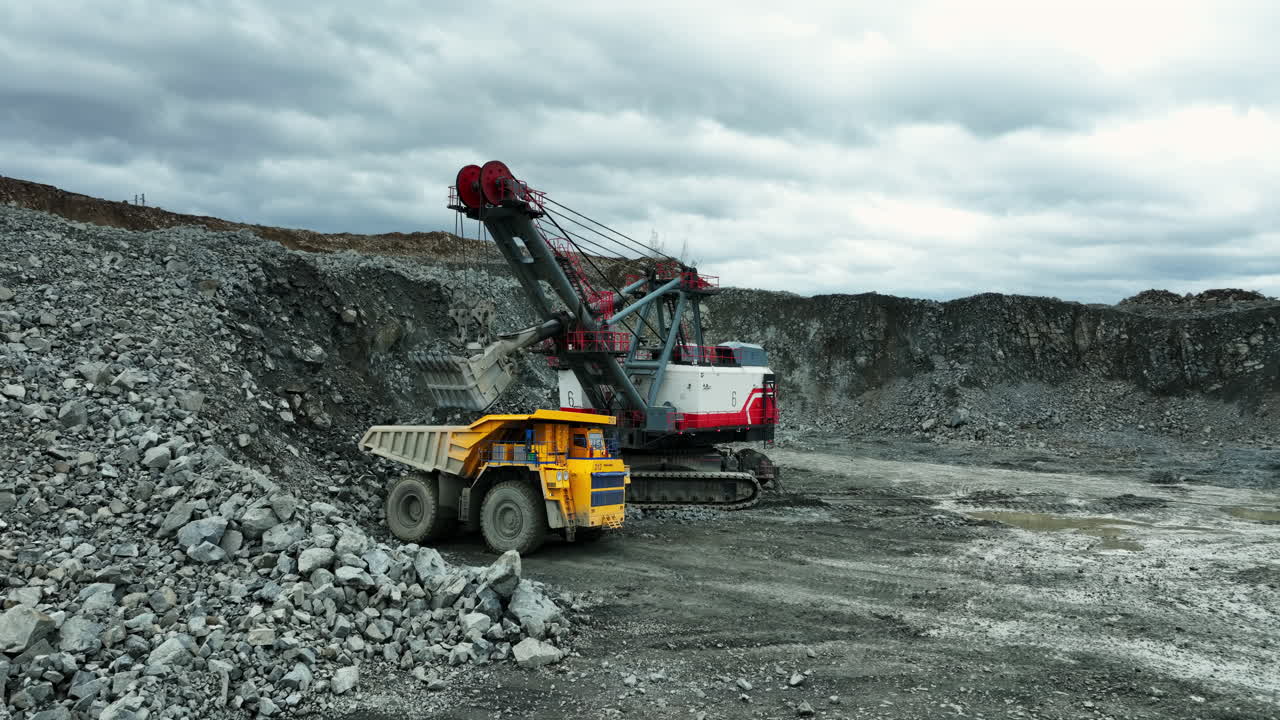 Open Pit Mining Operation with Excavator and Dump Truck
