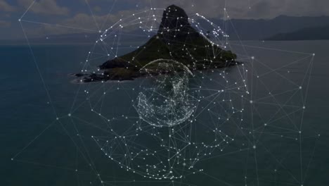 animación del globo con una red de conexiones, sobre una isla rocosa en el mar
