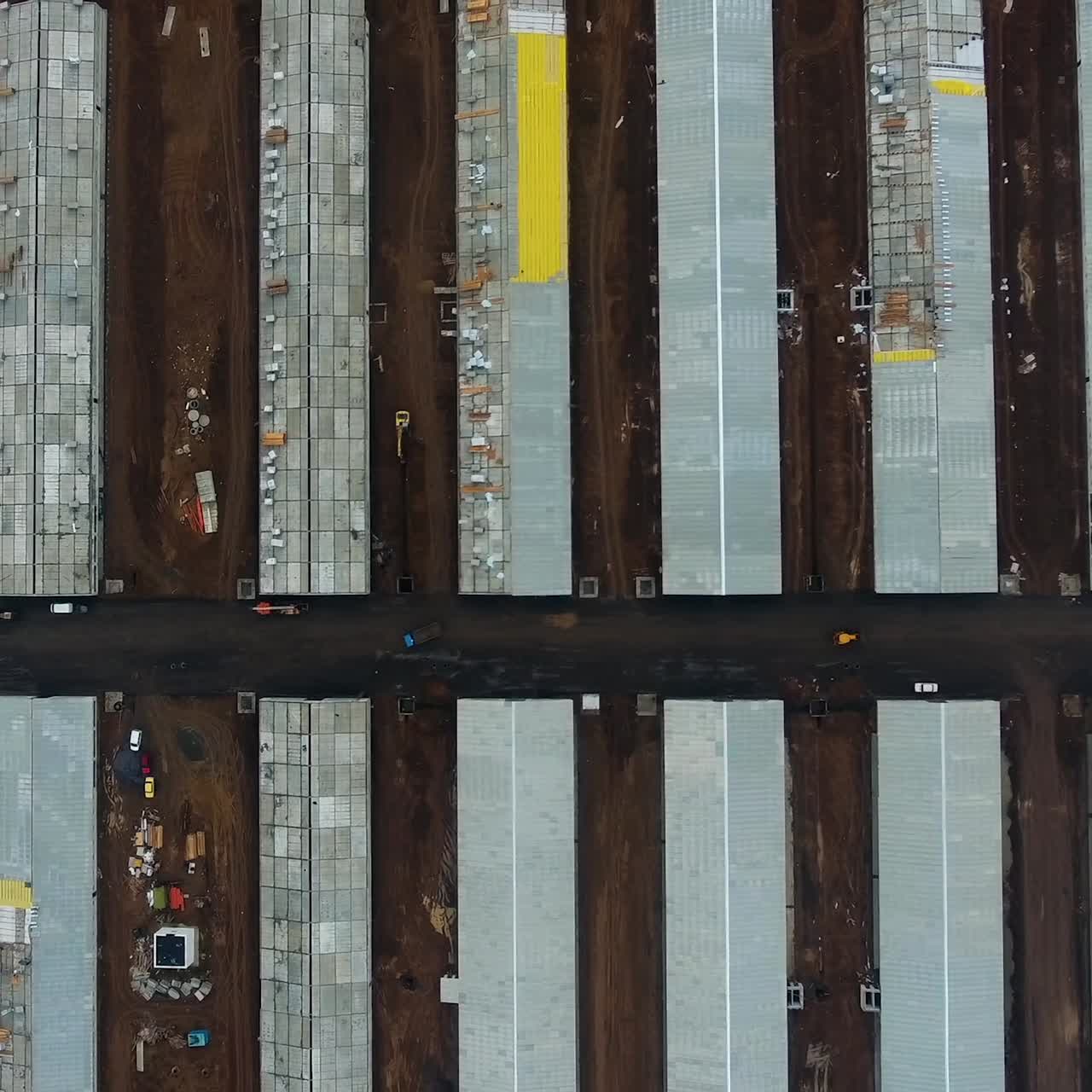 Aerial view on new buildings of future animal farm. Up to date agricultural farm in the field