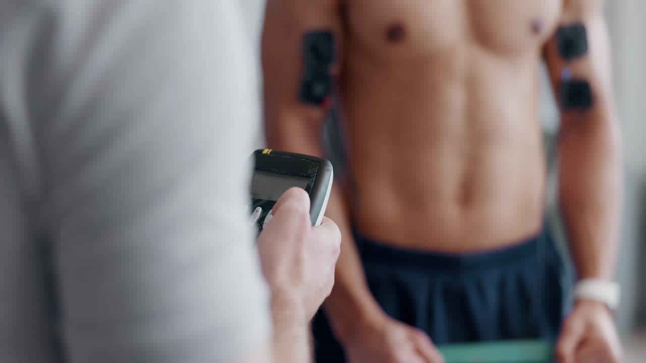 Person with electrical muscle stimulator