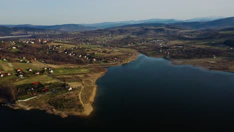 aerial panoramic view of idyllic lake mucharskie on coastal village in jezioro mucharskie, poland