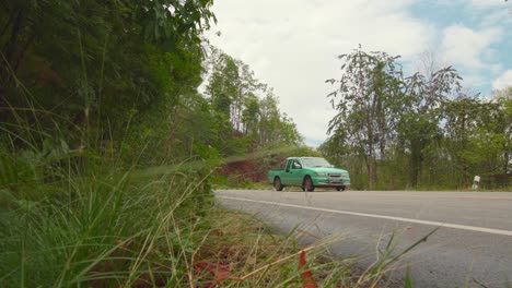 a bottom shot of of two cars are running on the calm road