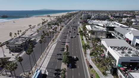 aerial footage of huntington beach coastline following pacific