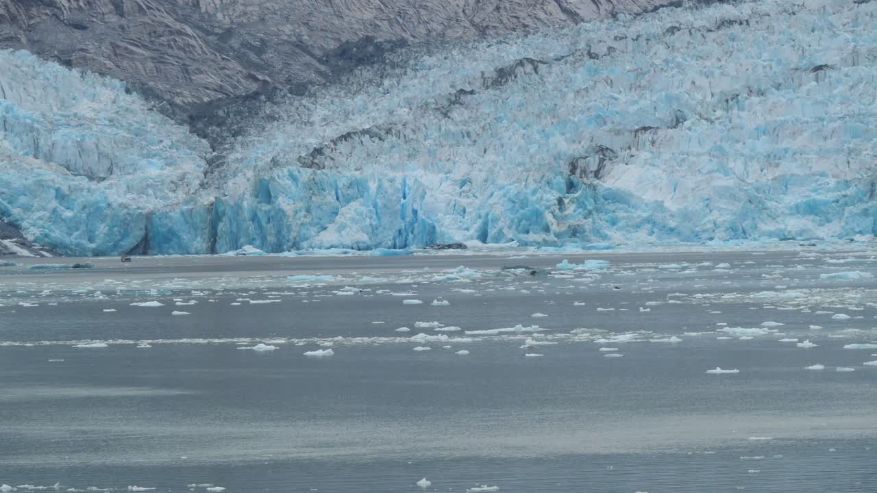 Frozen waters of the Dawes Glacier, active tidewater glacier, Endicott Arm fjord, Alaska.
