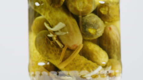 pickled cucumbers in a jar