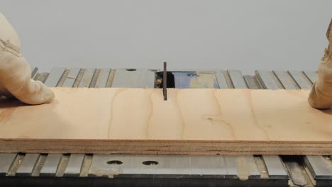 table saw cutting plywood