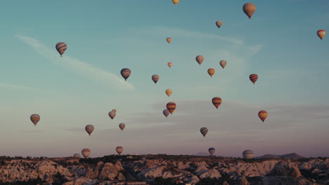 hot air balloons over cappadocia at sunrise