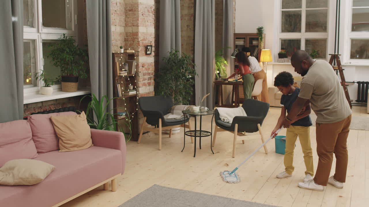 Afro Family Doing Household Chores Together