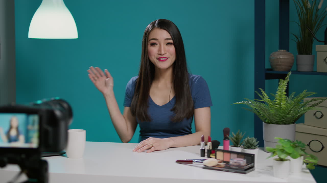 Content creator recording beauty videoblog with phone camera
