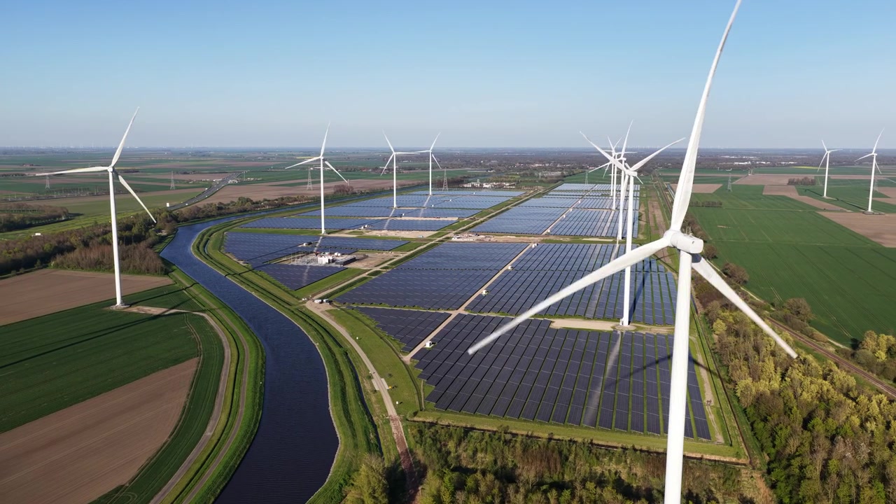 Aerial drone view of Eekerpolder solar and wind park in the Netherlands, showcasing renewable energy, green power, and sustainable infrastructure.