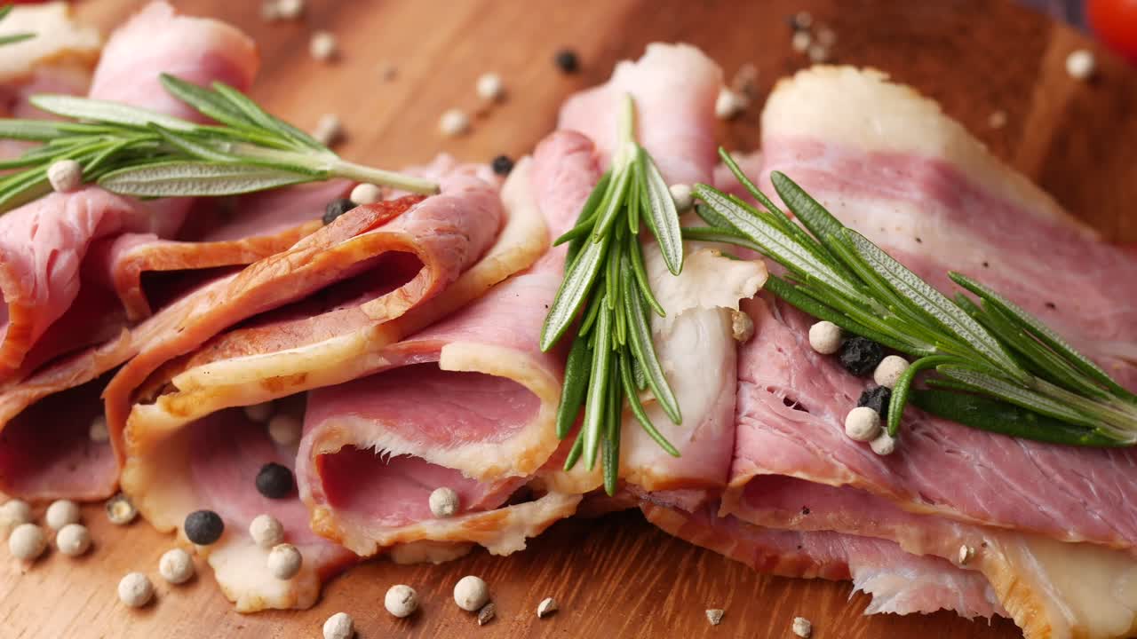 Sliced Cured Meat with Rosemary and Pepper