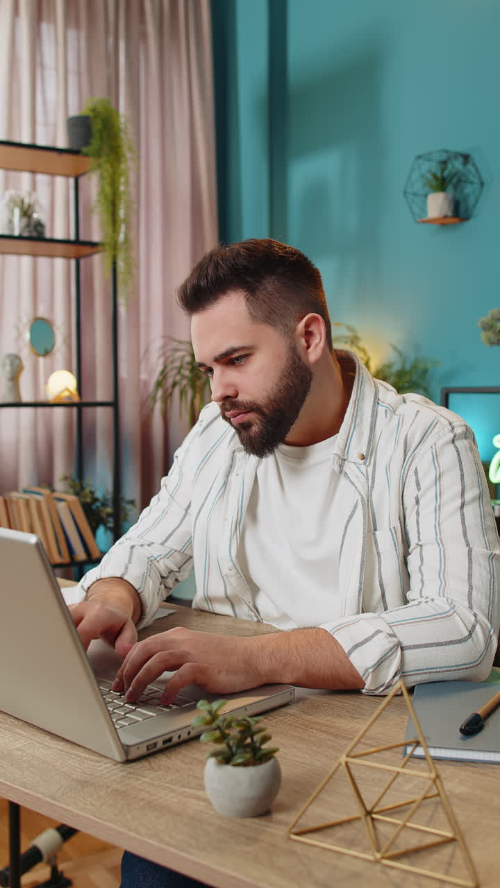 Sad frustrated annoyed business man suffers from unfair situation bankruptcy stress at home office