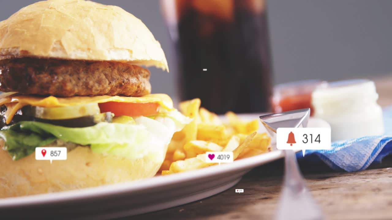 Badges spawning around glass, floating while camera shifting left revealing burger and fries buzz