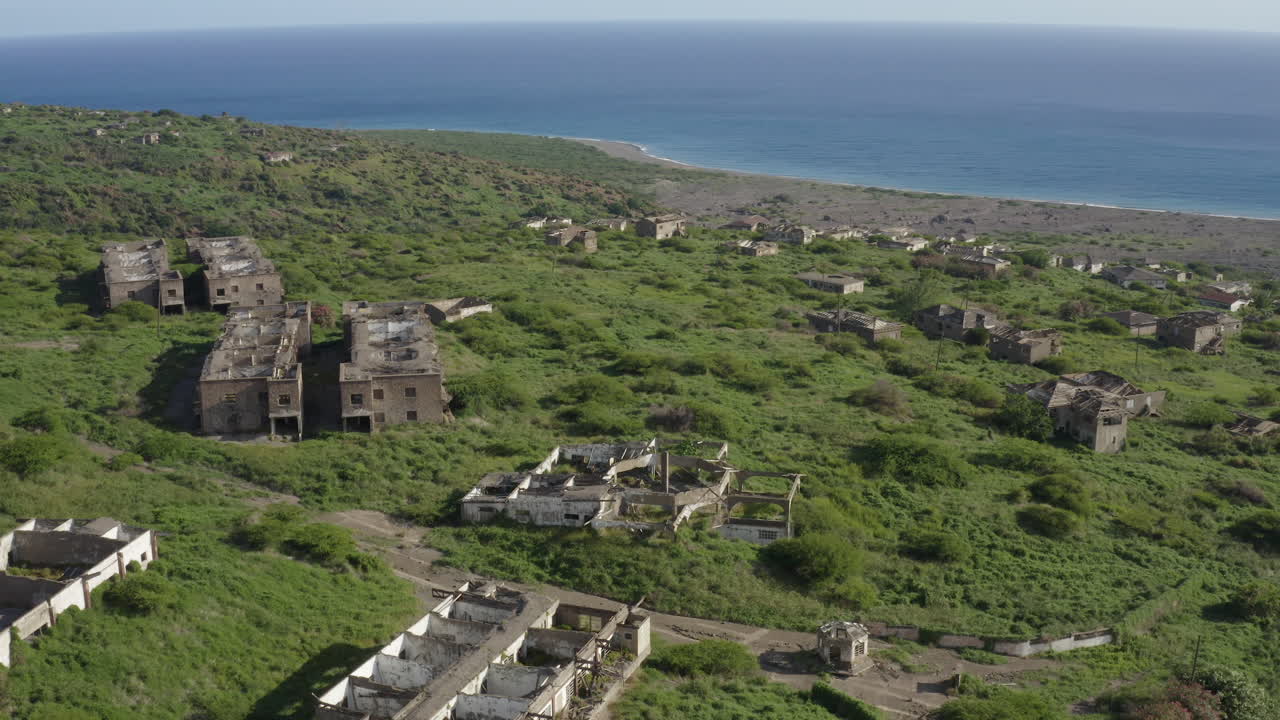 Smooth orbit above a long destroyed city. Mother nature reclaiming its land upon a volcanic Caribbean island. Part_2