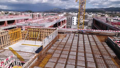 Construcción-De-Edificios-Con-Grúas-Vista-Aérea