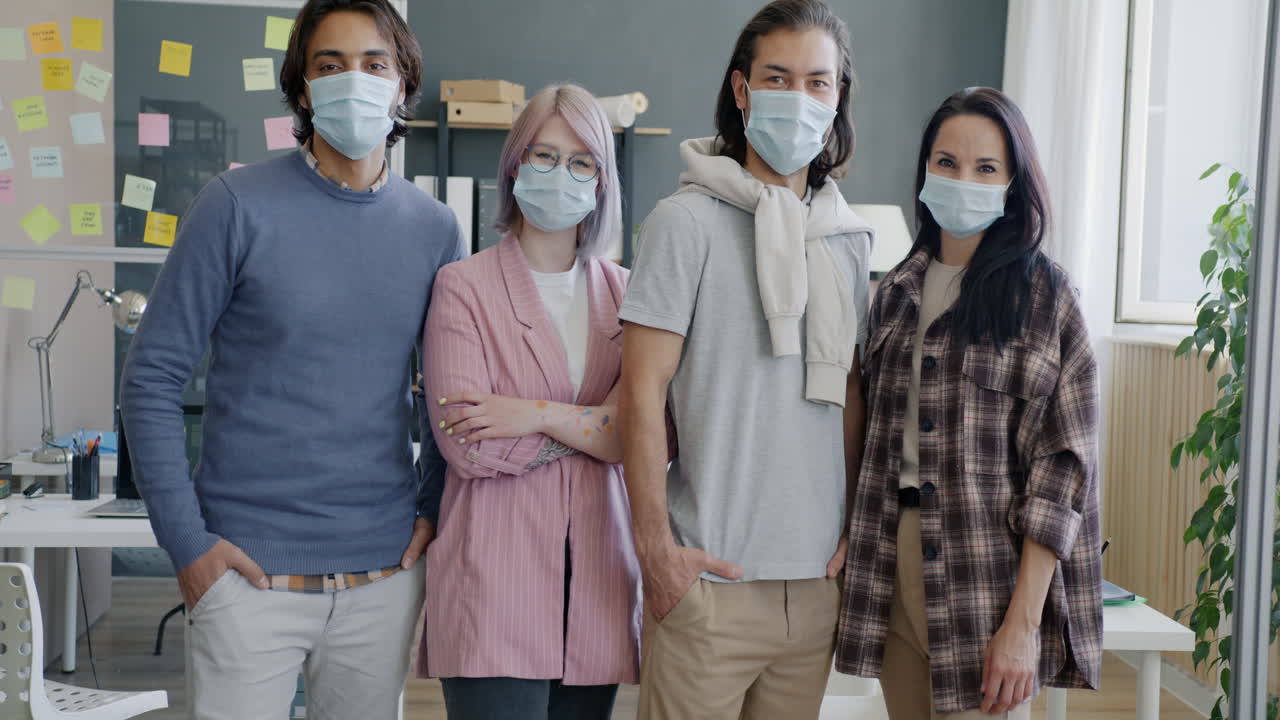 Team photo in office during pandemic
