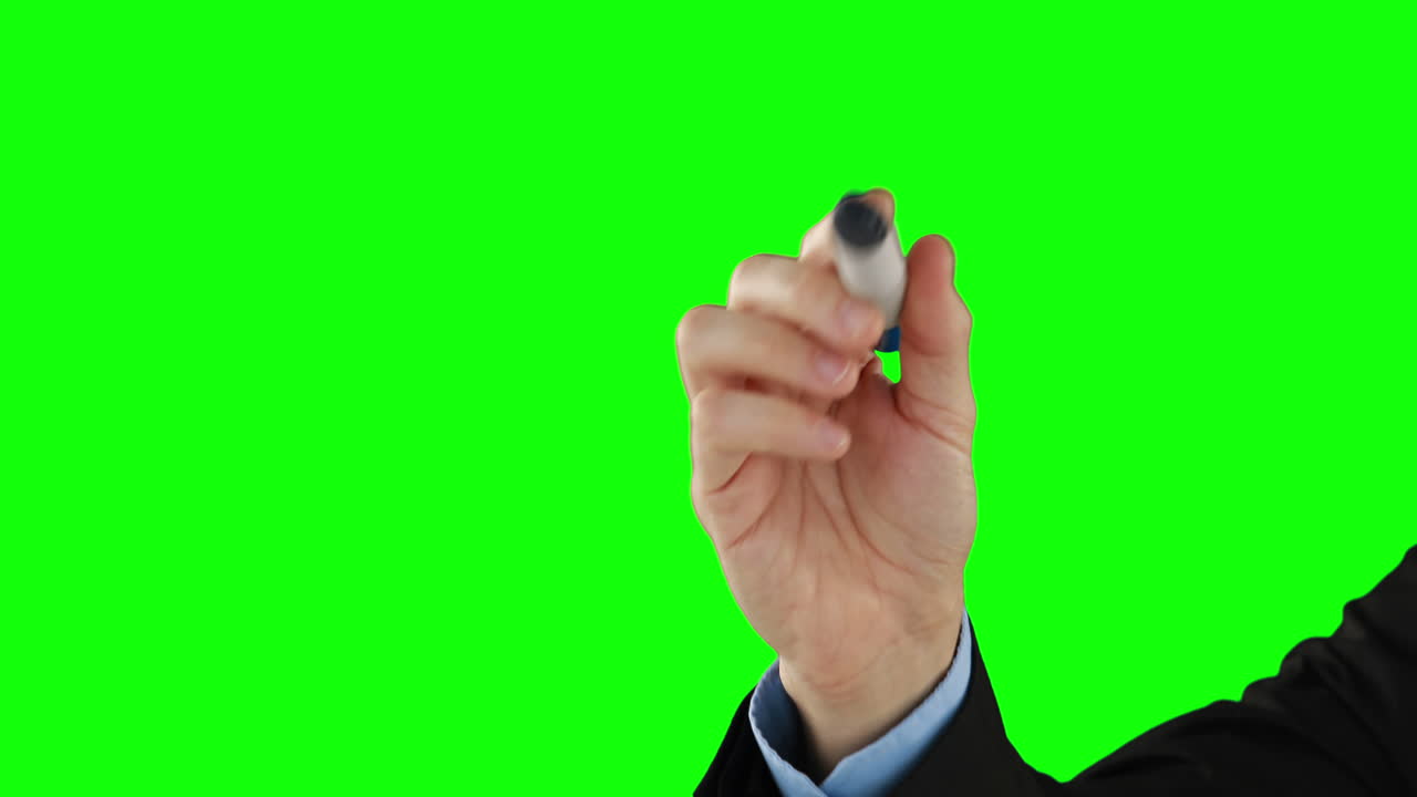 Businessman hand writing on an invisible board