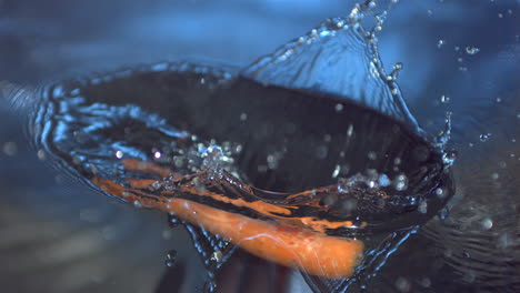 carrot falling into water