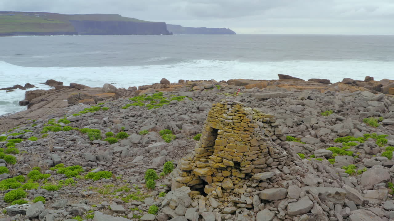 Aerial orbit of Constabulary outpost at Crab Island with the famous Cliffs of Moher in the background