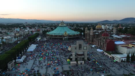 conquest to worship virgin mary at the basilica of our lady of guadalupe in mexico - circling aerial view