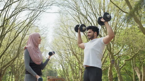 couple working out in a park