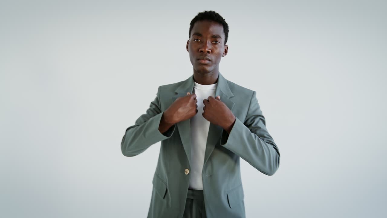 A young black man in a suit