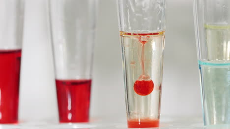 Technician-drop-blood-in-test-tube-4