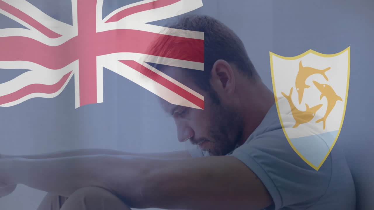 Animation of Union Jack and Anguilla flag with thoughtful man sitting in school