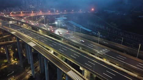 Breathtaking-highway-aerial-of-a-big-interchange-bridge-of-Chongqing,-Huangjuewan,-China