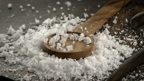 white salt crystals fall out in slow motion.