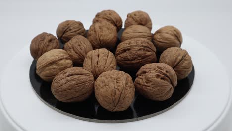 walnuts on turntable isolated on white background