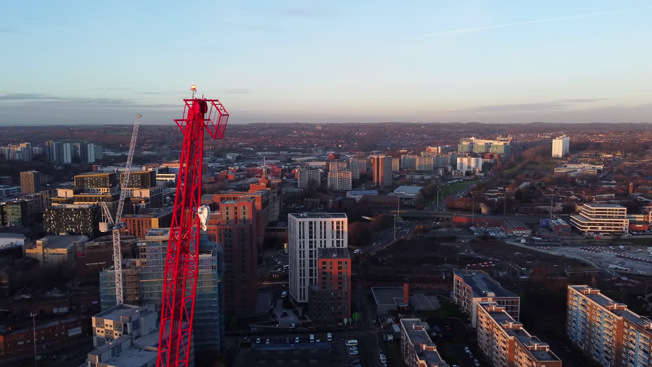 Tower Crane At The Construction Site In Leeds, England, UK. - aerial shot