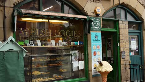 welsh oggie shop with food display and signage