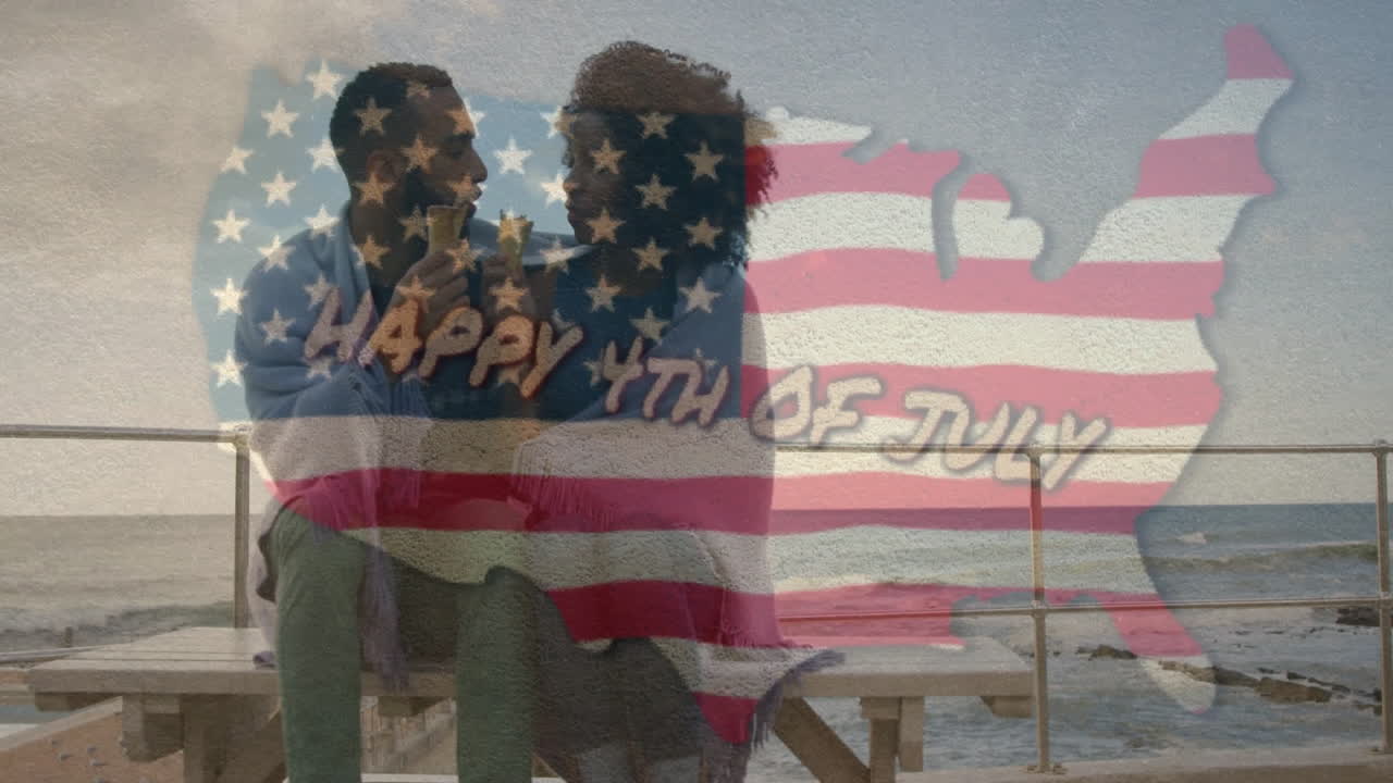 Couple sitting on beach with Happy 4th of July animation over American flag