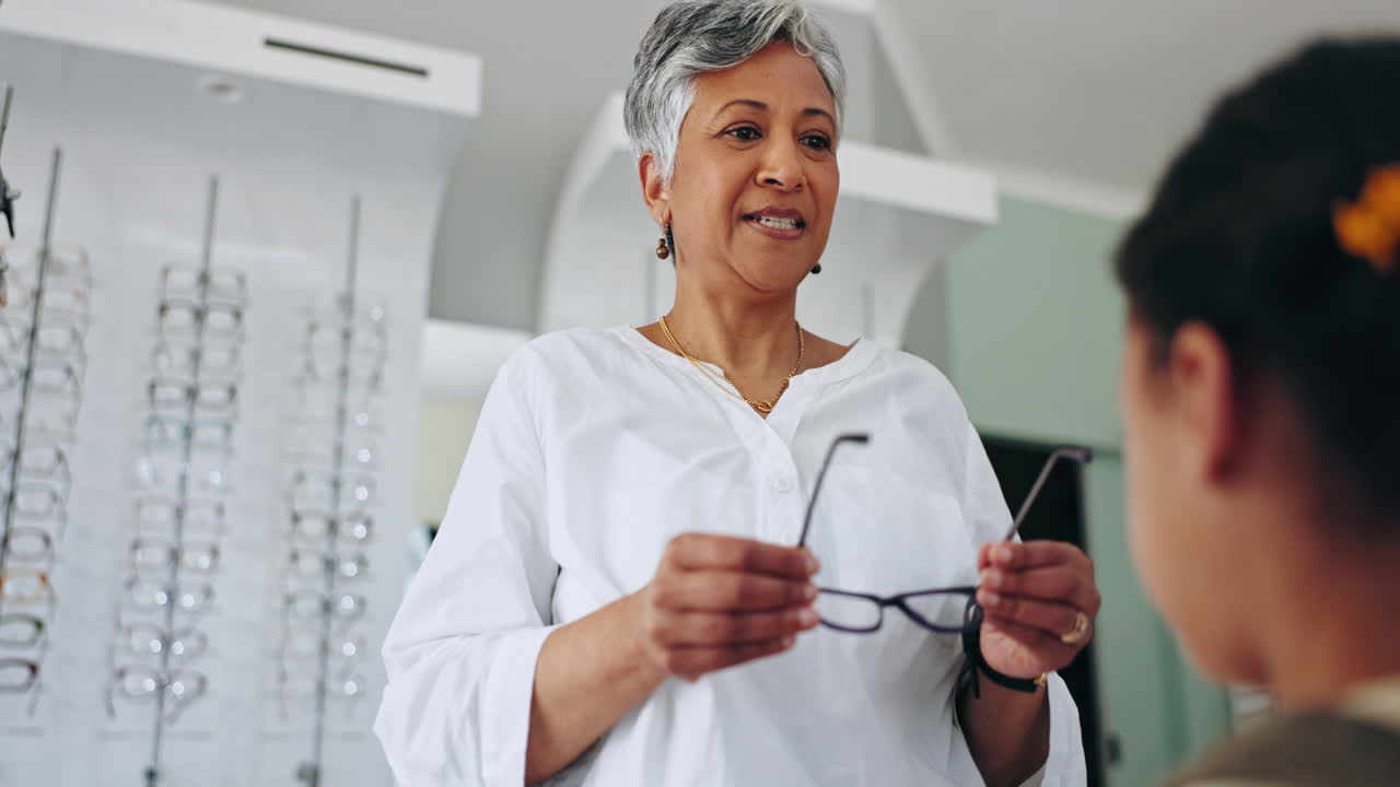 Woman, child and customer for eyeglasses