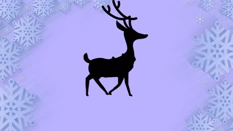 Black-silhouette-of-reindeer-walking-over-snowflakes-forming-a-frame-against-purple-background