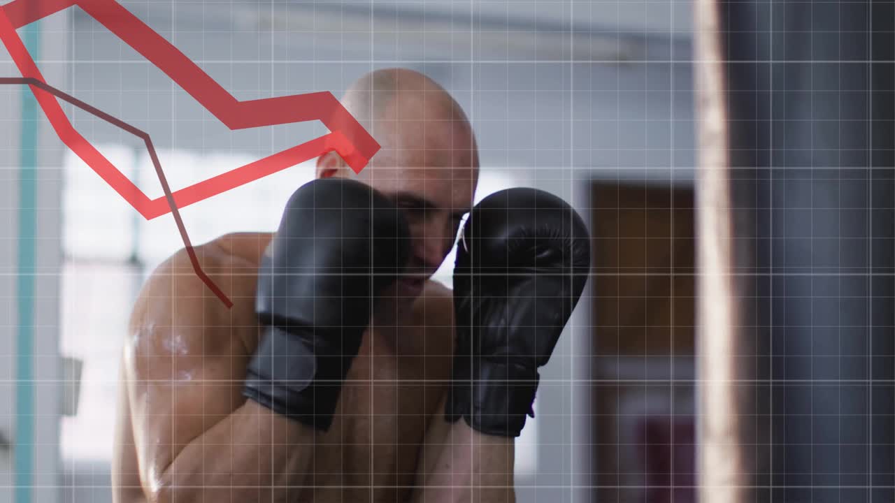 Pugile fitness in palestra che indossa i guantoni e colpisce un sacco da boxe, generando grafici rossi che mostrano il ritmo dei pugni.