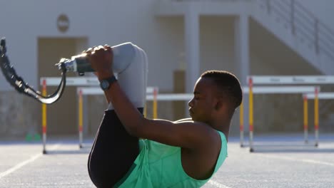 disabled athletic exercising on a running track 4k