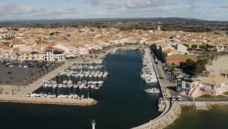 drone shot flying inside the fishing and recreational boating port of mèze thau