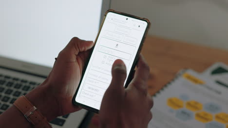 black man hands with phone booking airplane online