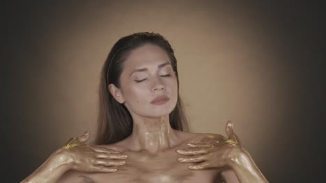 woman with gold body paint