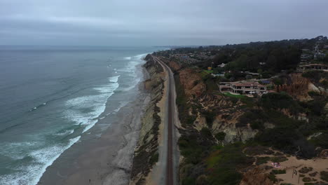 aerial view of amtrak pacific surfliner train tracks along the del mar coast in california